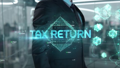 Businessman with Tax Return hologram concept
