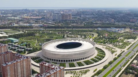 Krasnodar, Russia - August 29, 2020: Krasnodar - football stadium of the eponymous club in the city of Krasnodar. Public Park Krasnodar (Galitsky Park). Summer aerial view, Aerial View, Point of inte