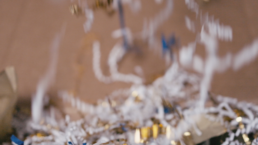 Colorful paper confetti falling in slow motion.  4K.  For background or texture. - Powered by Shutterstock - Get 15% off with code: PIKWIZARD15