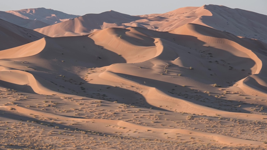 Time lapse at sunset on the sand dunes of the Rub al Khali desert (The Empty Quarter), Oman, Middle East Royalty-Free Stock Footage #1072744928