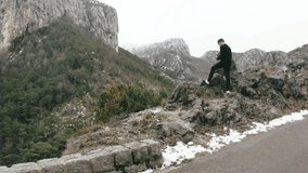 Man filming limestone rocks and scenic valley of Verdon Gorge, France