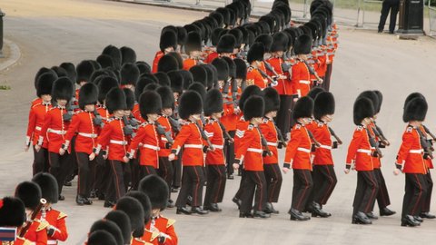 LONDON, circa 2019 - The Grenadier guards march in tight formation during the Trooping the Colour parade to mark the birthday of the Queen of England