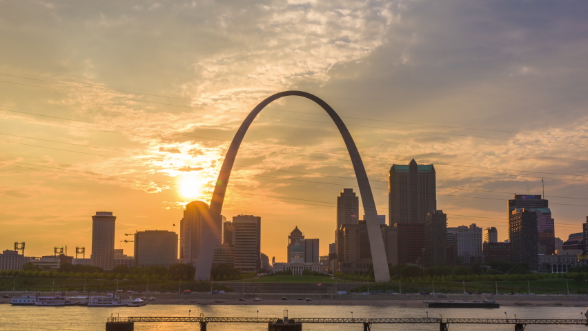 St. Louis, Missouri, USA downtown cityscape on the Mississippi River at sunset. 