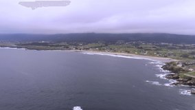 A 4K aerial footage of a village on the seashore