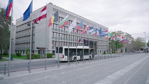 LJUBLJANA, SLOVENIA - 2021: Slovenian Parliament with all European flags slow motion 4K