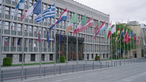 LJUBLJANA, SLOVENIA - 2021: Slovenian Parliament representing European nation with flags 4K