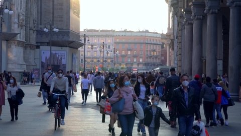 The public life of people in protective masks is walking along Corso Vittorio Emanuele II. End of coronavirus quarantine. Living with COVID 19. Tourists in the city.  Fashion. Milan Italy May 2021
