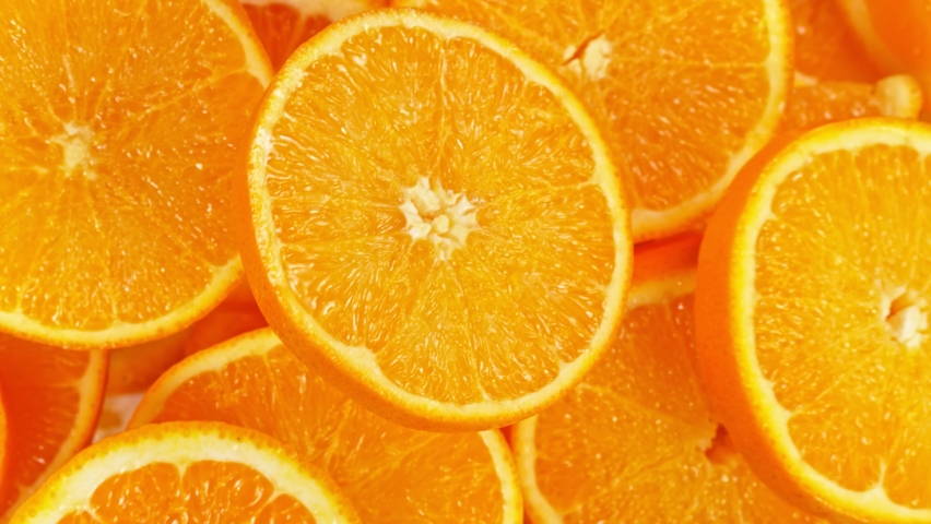 Super Slow Motion Shot of Flying Fresh Orange Slices Towards Camera at 1000 fps. | Shutterstock HD Video #1072862540