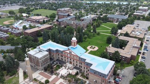 View of Downtown Denver Colorado from Regis University Drone Shot Pan Up