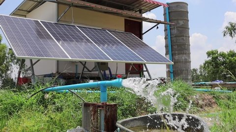 Water flows from the PVC pipe. The silver groundwater is pumped by a solar powered submersible pump from a Smart Farm solar panel.