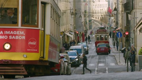 Lisbon , Lisbon , Portugal - 02 02 2019: Vintage trams and traffic on Rua da Conceição