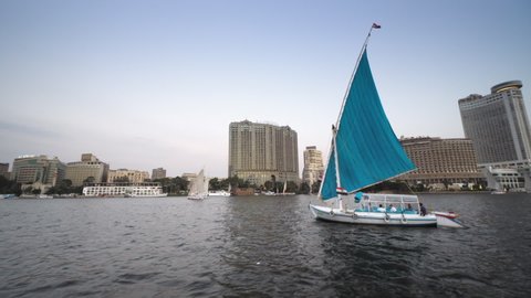 Cairo, Egypt - 15 September, 2019: People enjoying the skyline of Cairo city on a pleasure boat on the Nile river in Cairo, Egypt