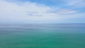 Professional 4K Video. Aerial view of drone. High angle view Seascape and blue sky background. Landscape view of sea in summer day. Beach space area. At Phuket, Thailand. 4K UHD. Video Clip