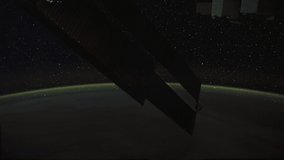 ISS Time-lapse Video of Earth seen from the International Space Station with dark sky and city lights at night over Africa, Time Lapse 4K. Images courtesy of NASA. Pan up motion timelapse.