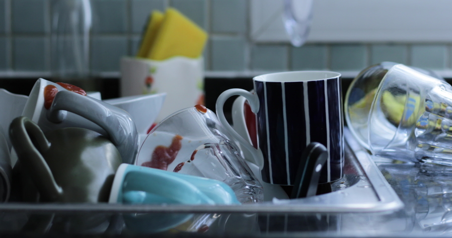 dirty dishes at the kitchen Royalty-Free Stock Footage #1072910540