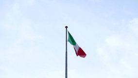 Italian flag moving in the wind with clear and bright sky background - Powered by Shutterstock - Get 15% off with code: PIKWIZARD15