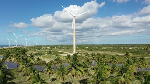Rural landscape of clean energy wind farm at near Jericoacoara, Ceara, Brazil. Aeolian turbine. Aeolian energy. Sustainable energy turbines. Clean energy to control climate change. Rural landscape.