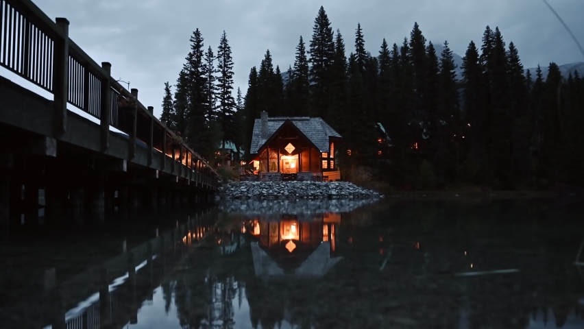 Wooden house lighting reflection on Emerald lake at Yoho national park, Canada
