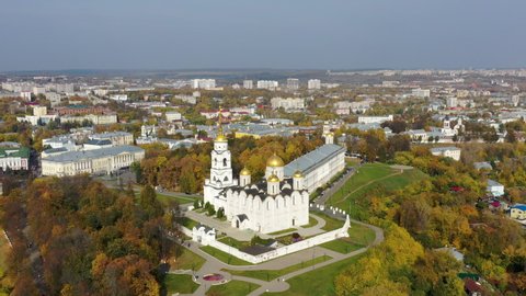 Aerial footage of Vladimir town and Assumption (Uspensky) cathedral on sunny autumn day. Vladimir Oblast, Russia.
