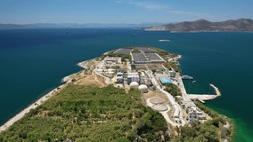Aerial drone video of latest technology sewage treatment plant and sludge drying facilities located in Mediterranean island