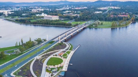 Aerial hyperlapse of Commonwealth Bridge on Lake Burley Griffin during a beautiful sunset in Canberra, the capital of Australia 