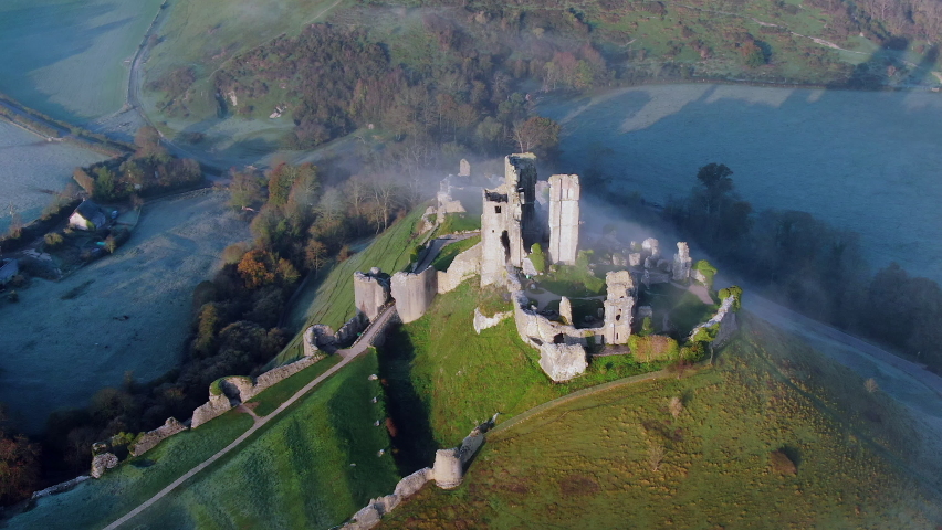 Aerial footage of Corfe Castle, Corfe, Isle of Purbeck, Dorset, England