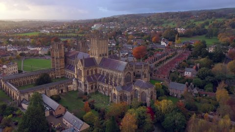 Aerial over Wells and Wells Cathedral, seat of the Bishop of Bath and Wells, Somerset, England