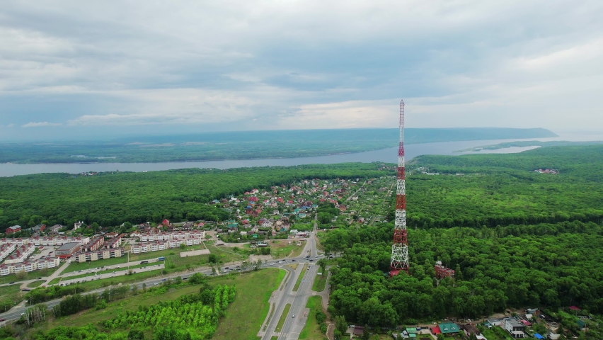 Communication tower in country land aerial video