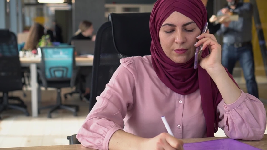 muslim businesswoman hijab works multi-racial team Stock Footage Video ...