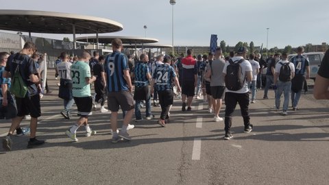 Milan- italy- may 23 2021 - f.c. Inter fans celebrating winning of italian soccer championship outside San Siro stadium closed because of covid 19 emergency - supporters outside san siro