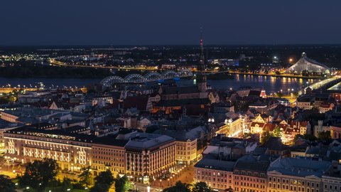 Establishing Aerial View Shot of Riga, Riga skyline, Latvia, very city center at night evening