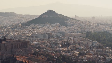Establishing Aerial View Shot of Athens, Parthenon, sunny Acropolis, Greece