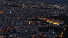 Establishing Aerial View Shot of Athens, Panathenaic Stadium 330 BC, sport event, Greece at night evening