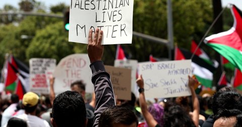Los Angeles, California, USA - May 15, 2021: Individuals protest the hostile actions of Israel in a Free Palestine event.