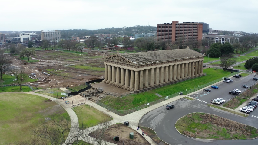 Pantheon of Nashville in aerial drone static view while car drives