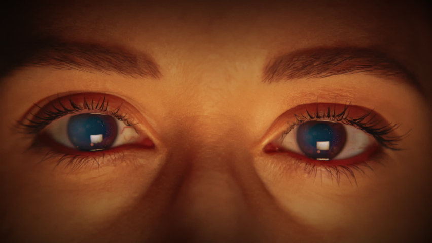 Caucasian female has flames in her eyes. We have more variations of the human eye, for more check out this seller's other videos. | Shutterstock HD Video #1072988207