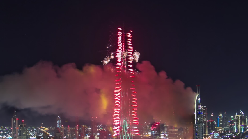 DUBAI, UAE - 1 JAN 2016: Dubai Burj Khalifa New Year fireworks celebration timelapse and the Fire accident occured from the The Address Hotel at Dubai, UAE. View from top fisheye
