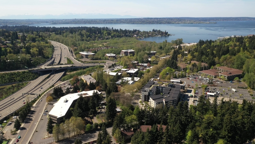 Cinematic 4K drone footage of Lakeview, Central Houghton, Marina Park Pavilion, Yarrow Bay, Lake Washington commercial, residential neighborhoods near Bellevue and Seattle, King County, Washington