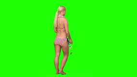 Chroma-key footage of a blond woman in swimsuit holding diving equipment
