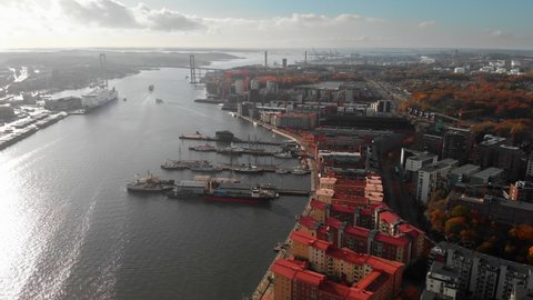 Gothenburg Port and River in Bright Sunlight. High Aerial Pan Left.