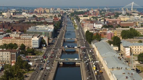 Saint Petersburg, Russia - 05.22.2021: panoramic view, Neva River, bridges, the  summer day, sunny, St. Petersburg, drone footage
