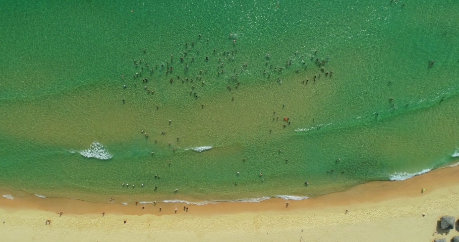 Ky Co Island, A fishing boat, some peole in the sea, Beautiful landscape of Quy Nhon, Binh Dinh, Central of Vietnam