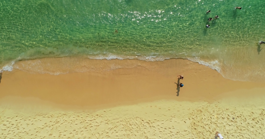 Ky Co Island, A fishing boat, some peole in the sea, Beautiful landscape of Quy Nhon, Binh Dinh, Central of Vietnam