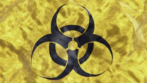 Realistic looping slow motion 3D animation of the grungy textured waving yellow flag with Biohazard symbol rendered in UHD