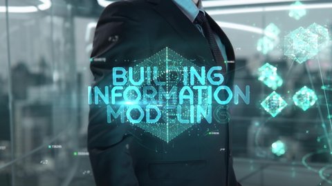 Businessman with Building Information Modeling hologram concept