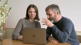 Caucasian Beard Middle Aged Man Talking With Attractive Woman About New Project. 
