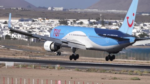 Canary islands, Spain JUNE, 02, 2019 TUI Airlines Belgium flight. Boeing 767 performing landing rollout on the runway of Lanzarote Airport. High quality slow motion FullHD footage