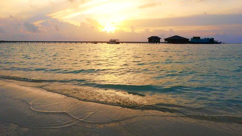 Sunset in the Maldives beach