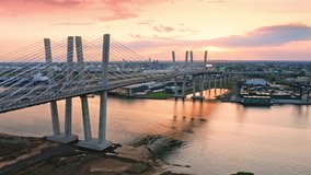Drone footage of the new cable-stayed Goethals bridge at sunset, with forward camera motion. Goethals bridge spans Arthur Kill strait, between Elizabeth, NJ and Staten Island, NY