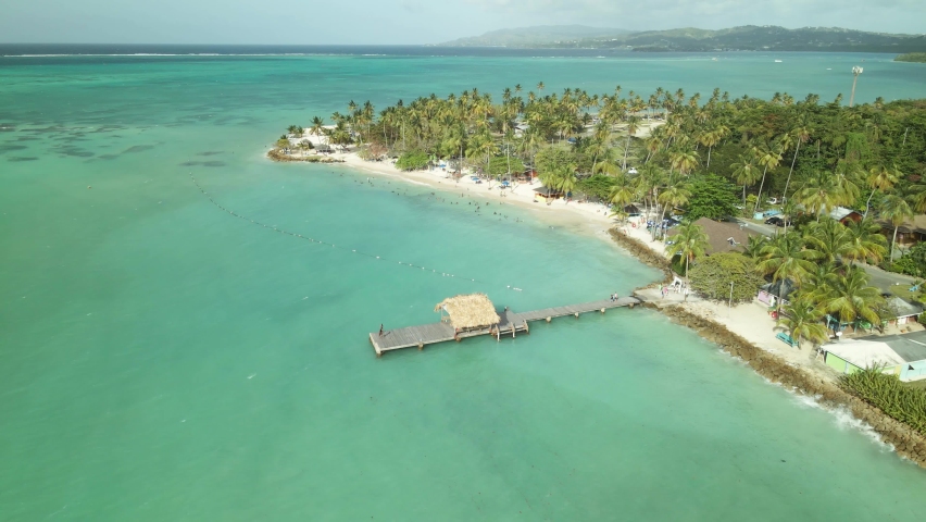 Descending aerial view of Pigeon Point Heritage Park located in the Caribbean island of Tobago